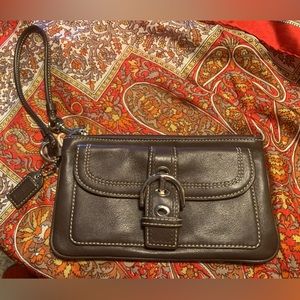 Coach wristlet in brown leather